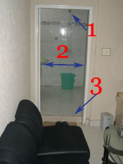 Photo 0 inaccessible toilet, with narrow door, step at entrance, and high mounted shower