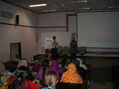 Photo: Galuh Sukmara giving presentation on DRR